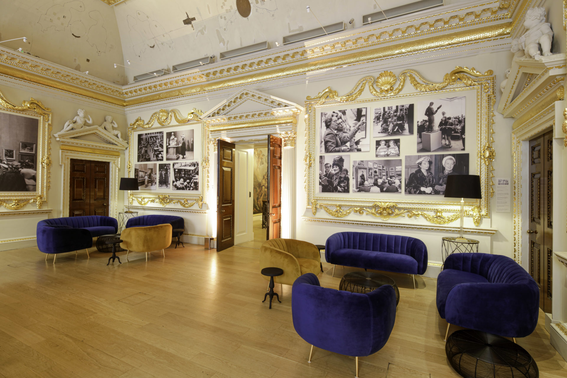 Velvet armchairs spaced out for a socially distanced event